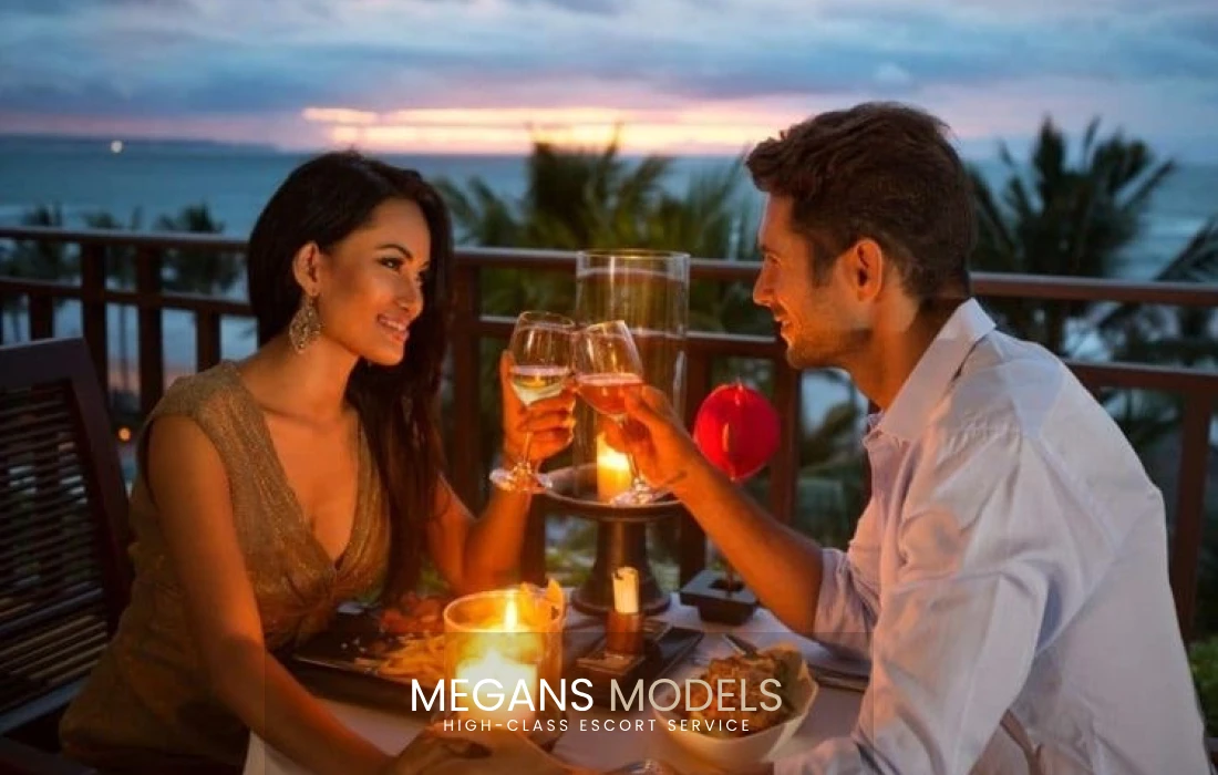 A couple enjoying a romantic dinner on the beach 